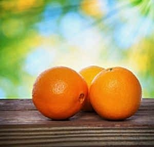 oranges on a wooden table